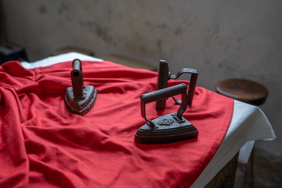 How to Restore a Rusty Cast Iron Skillet (And Why You Shouldn't Give Up on It) Well-seasoned cast iron skillet on wooden workbench with restoration tools and warm natural light